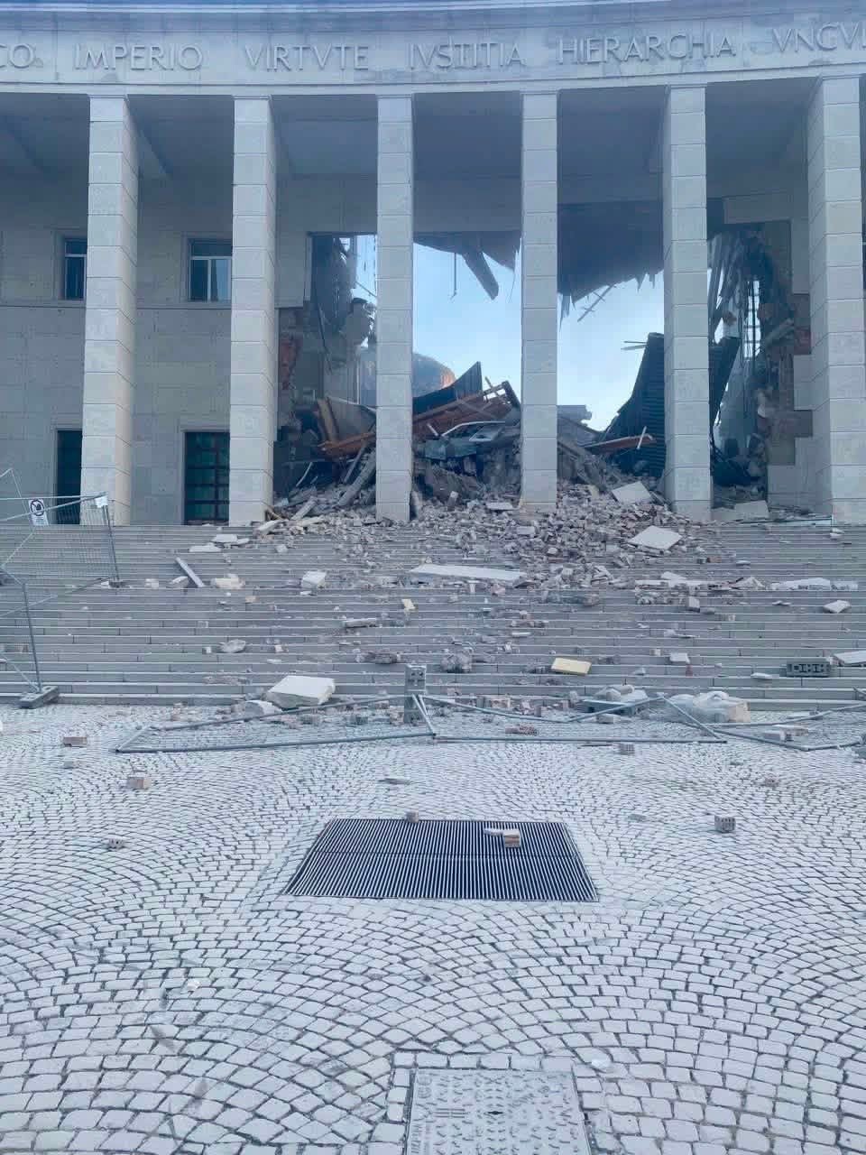 Rubble field down the monumental steps of the Bolzano courthouse after the July 2026 collapse